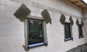 Ile za metr tynku na elewacji? Ceny, koszty robocizny i porady.
